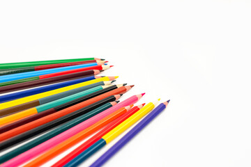 Color pencils isolated on white background. School supplies, creativity concept
