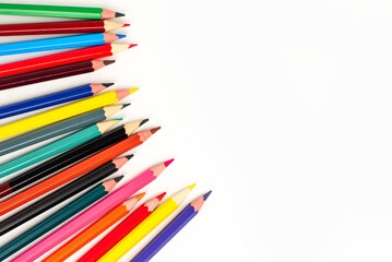 Color pencils isolated on white background. School supplies, creativity concept