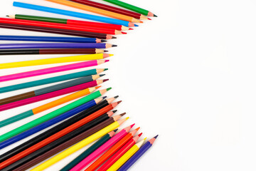Color pencils isolated on white background. School supplies, creativity concept