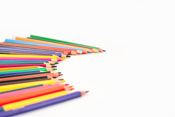 Color pencils isolated on white background. School supplies, creativity concept