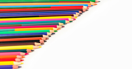 Color pencils isolated on white background. School supplies, creativity concept