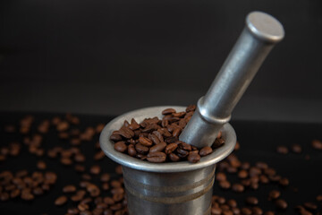 coffee beans in a mortar