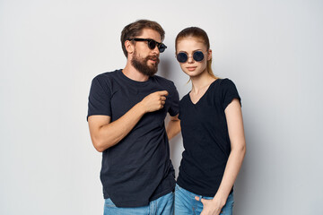 fashionable man and woman friendship communication romance wearing sunglasses studio lifestyle