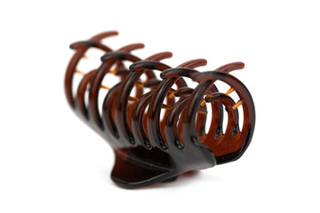 brown hair clip isolated on the white background