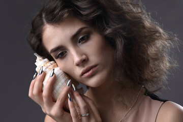 Obraz premium Listening to the distant sound of the sea