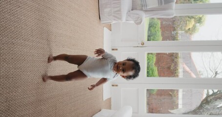 portrait baby girl walking taking first steps toddler enjoying life healthy little infant on vertical orientation video chat concept