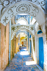 Traditional houses and churches decorated with the famous geometric scratch patterns in the medieval mastic village of Pyrgi on the island of Chios, Greece