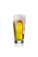 Beer glass isolated on white background with foam.
