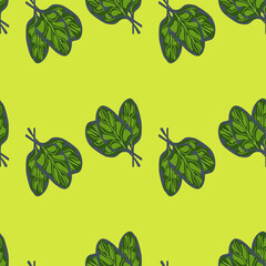 Seamless pattern bunch spinach salad on bright green background. Simple ornament with lettuce.