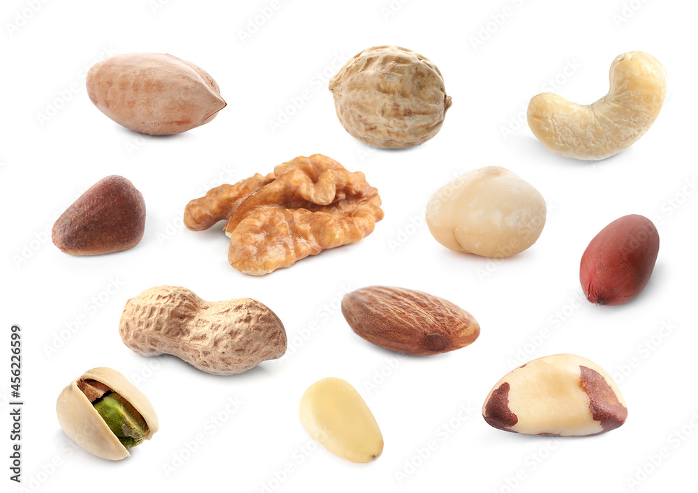 Wall mural Set with different tasty nuts on white background - Wall murals