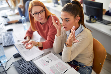 A female student frustrated about a new lesson. Smart young people study at the college. Education, college, university, learning and people concept