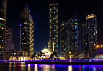 Fototapeta premium View of the night skyscrapers. High hotels on the seaside.