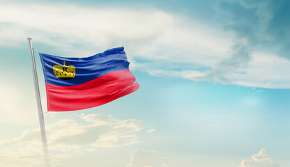 Liechtenstein national flag cloth fabric waving on the sky - Image