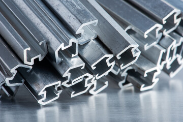 Pile of aluminium profiles, heavy metallurgy industrial products