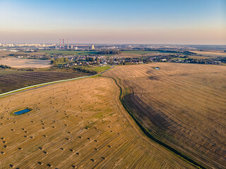 Aerial view of fields in the sunset light, Minsk, Belarus. Drone aerial view
