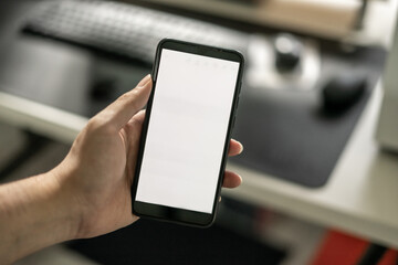 Man using smartphone mockup with white screen