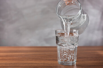 Glass of fresh water on the table.