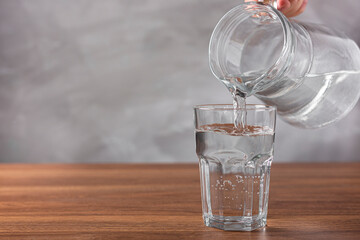 Glass of fresh water on the table.