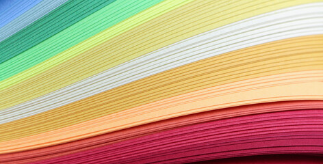 Abstract bright color wave curl rainbow strip paper horizontal background.