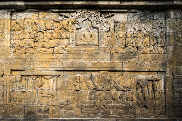 Bas-relief statue at Borobudur, a 9th-century Mahayana Buddhist temple in Central Java