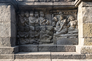 Bas-relief statue at Borobudur, a 9th-century Mahayana Buddhist temple in Central Java