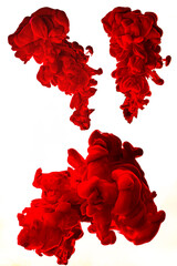 bright red ink cloud underwater isolated on white background. colorful splash