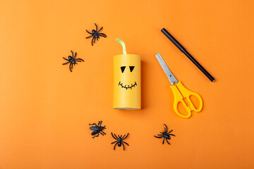 Halloween DIY and kids creativity. Step by step instruction: making orange monster pumpkin from...