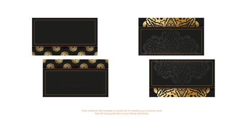Black business card template with golden Indian pattern