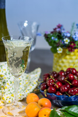Tasting of white dry German riesling wine from Mosel river valley with summer fruits