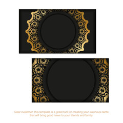 Black business card with golden indian pattern