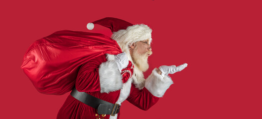 Emotional senior male model old man with a natural white beard Father Christmas