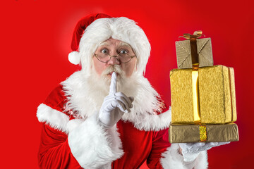 Emotional senior male model old man with a natural white beard in the role of Father Christmas