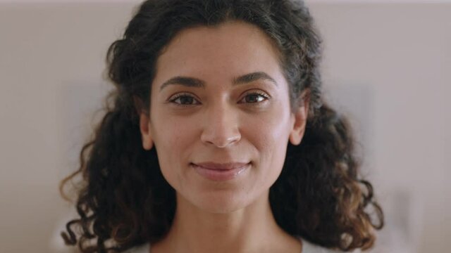 portrait beautiful mixed race woman smiling looking up at camera with happy emotion enjoying successful lifestyle 