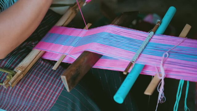 Traditional Karen Weaving Thread to produce handcrafted scarfs souvenir in Chiang Mai, Thailand