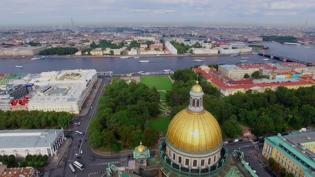 Top view of St. Isaac's Cathedral in St. Petersburg, Russia. View of Vasilievsky Island, Peter and Paul Fortress, Lakhta Center, Neva River and other tourist attractions in summer. Aerial. 4K Video