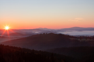 beautiful landscape with a sunrise over the mountains