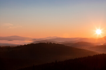 beautiful landscape with a sunrise over the mountains