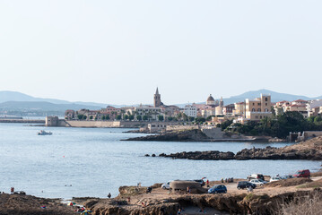 Fototapeta na wymiar The West Coast of Sardinia with the city Alghero in the North.