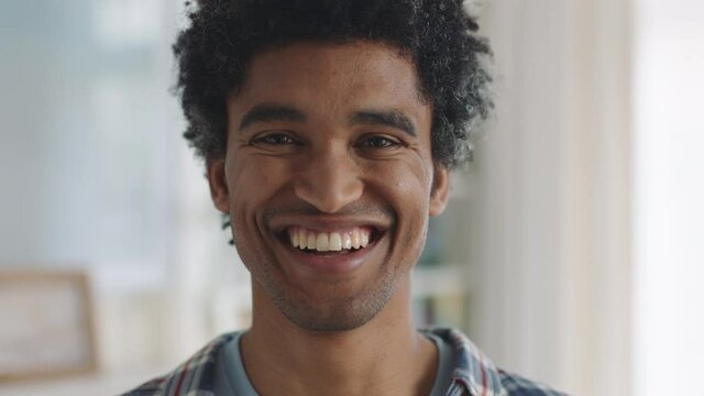 portrait happy mixed race man smiling enjoying successful lifestyle healthy man at home looking confident