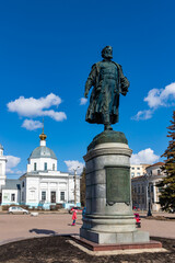 Fototapeta premium Monument to Afanasy Nikitin on the Volga embankment in Tver on a sunny spring morning