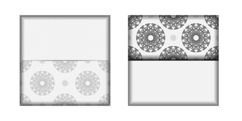 Invitation card design with space for your text and Greek ornaments. Postcard design White colors with black mandala patterns.
