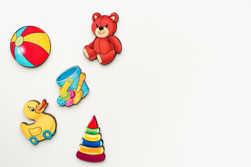 Children's wooden toys. Educational toys on a white background. Bright toys. 
