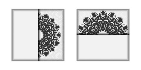 Invitation template with space for your text and black ornaments. Ready-to-print postcard design White colors with mandalas.