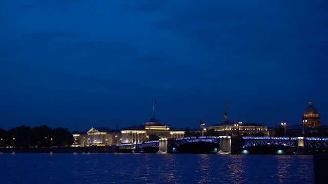 St. Petersburg,Russia -May 31-2021: Timelapse the Divorcing Palace Bridge at night in St. Petersburg and passing ships