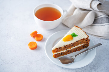 Carrot cake with cream cheese filling in a plate
