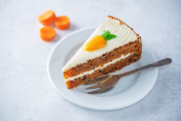 Carrot cake with cream cheese filling in a plate
