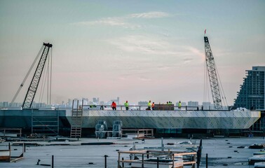 Obraz premium cranes in port Miami Florida work people construction maritime 