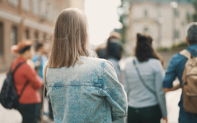 Female tourist on sightseeing tours in the old town.