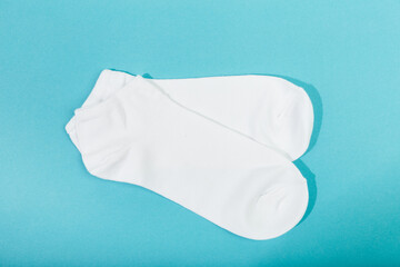  white socks on blue  background.