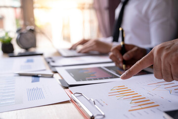 Business Consulting meeting working and brainstorming, discussing, business strategy, analyzing with financial data and marketing new business project finance investment concept